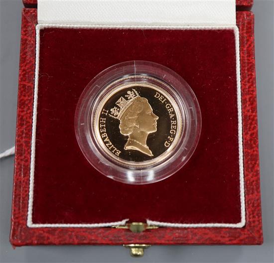 A cased 1985 gold proof full sovereign.